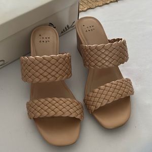 Tan size 6 “A New Day” heels.